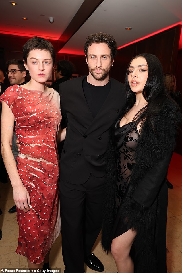 The pair were later joined for photos with Aaron Taylor-Johnson, who stars as Friedrich Harding in the upcoming horror film