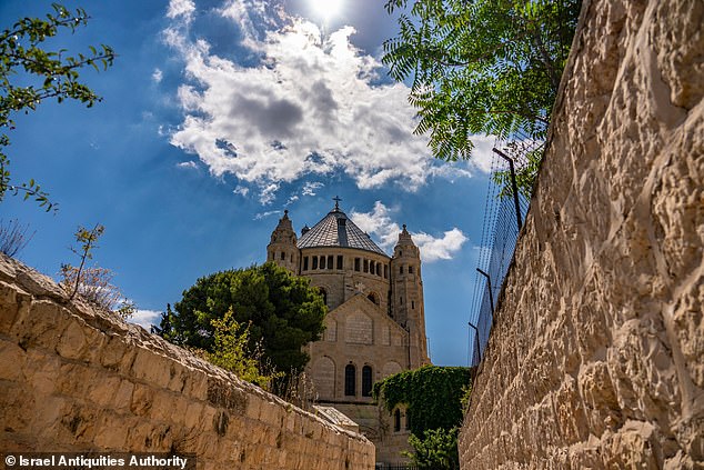 The approximately 500-year-old porcelain shard, believed to be the remains of a Ming Dynasty bowl, was discovered in the shadow of the 'Church of the Dormition' (above) - built in honor of the place where the Virgin Mary is believed to have died are – on top of the highest point in Jerusalem