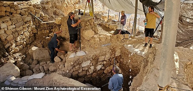 The excavation site on Mount Zion is steeped in many tricky and overlapping layers, all rich in history. Above, another team led by British-born archaeologist Professor Shimon Gibson makes its way through a confusion of Byzantine-era structures also buried on Mount Zion.