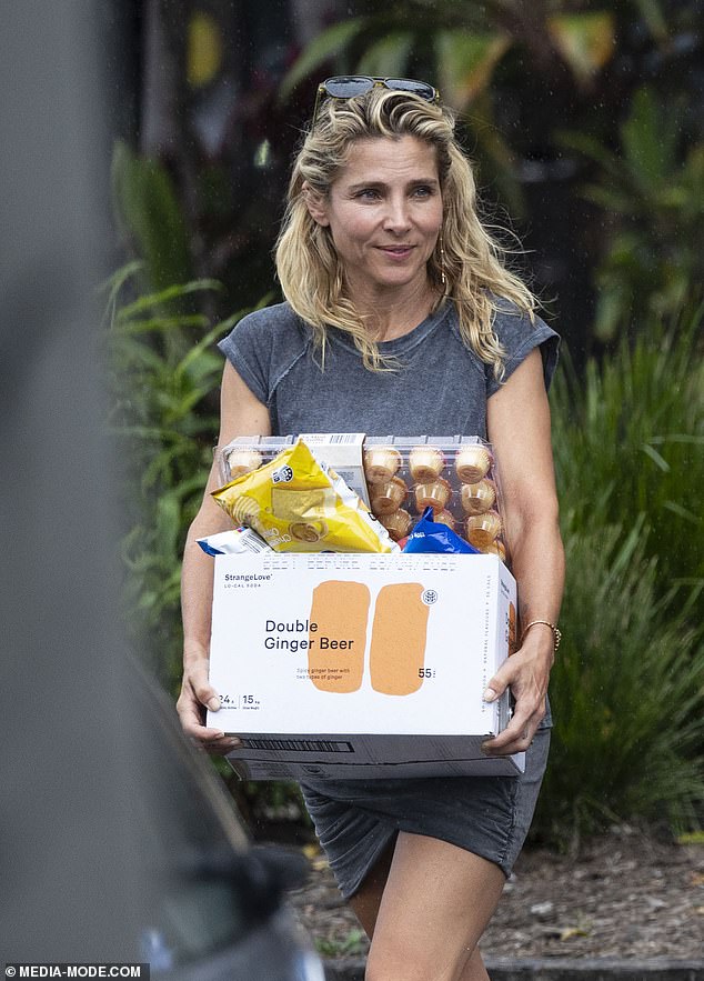 The Spanish actress, 48, was photographed stocking up on basics as she prepared to restock the fridges before Chris returned to their family home