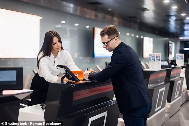 The new trend known as 'check-in chicken' sees people waiting until the last minute to check in so they can get a nicer seat (File image)