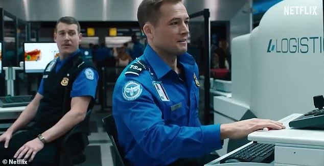 In the film, Taron plays a transportation security agent (TSA) who is blackmailed by Jason's character to smuggle dangerous items aboard a flight on Christmas Eve.