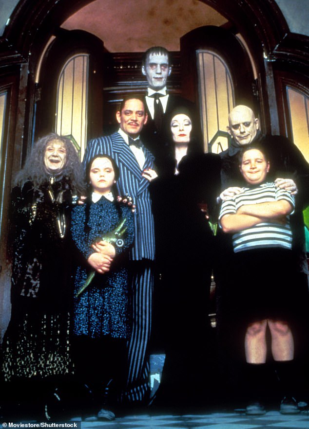 That's right, it's Carel Struycken (middle)! He famously played Lurch in the 1991 film The Addams Family; (L-R) Judith Malina, Christina Ricci, Raul Julia, Struycken, Anjelica Huston, Christopher Lloyd and Jimmy Workman seen in a still life