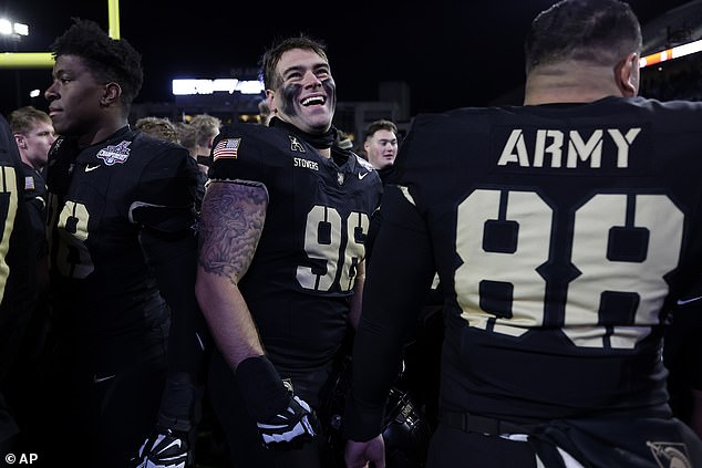 Defensive lineman Dillon Stowers (96) reacts after the AAC Championship