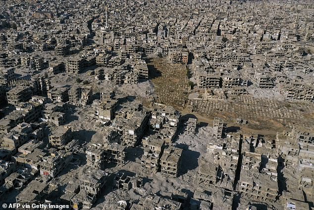 An aerial photo shows the destruction at the Yarmouk camp for Palestinian refugees and its cemetery, in southern Damascus, Syria on December 14