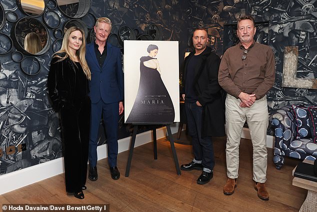 The star appeared in good spirits as she posed for photos with Guy Hendrix Dyas, Massimo Cantini Parrini and Steven Knight