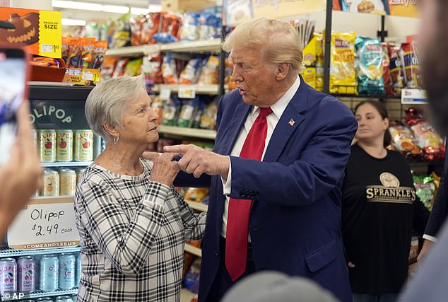 Donald Trump talks while visiting the family-owned Sprankle Neighborhood Market in Kittanning, Pennsylvania