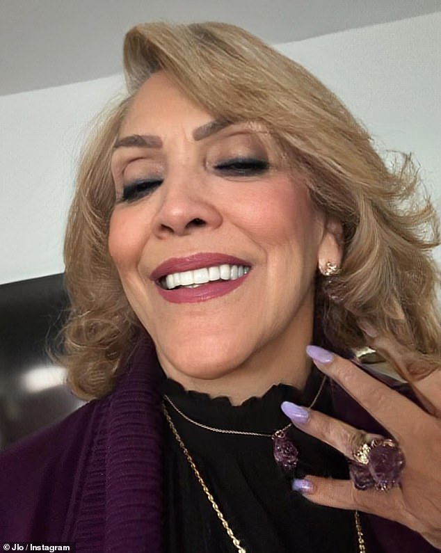 Her post also included a more recent selfie her mother took of herself showing off her glamorous purple jewelry that matched her outfit and makeup