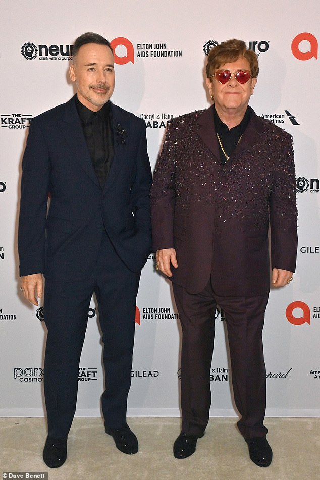 Emotional David, who married the Rocket Man singer in 2014, admits: 'That really upset me because in my mind I think Elton will live forever' (pictured together 2023)