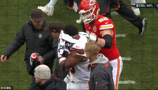 As he left the field, Thuney appeared to apologize for poking Garrett in the eye