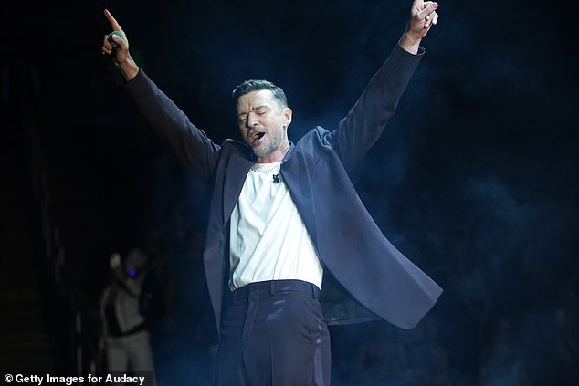 The 43-year-old pop star was performing at Nashville's Bridgestone Arena during his Forget Tomorrow World Tour when things took an unexpected turn, as a harness around his waist drew attention to a particularly prominent area; (seen in September)