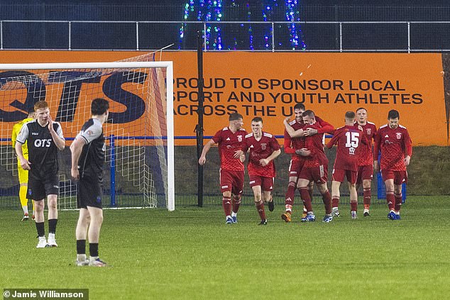 Johnstone Burgh celebrates a goal on his way to eliminating the cup holders