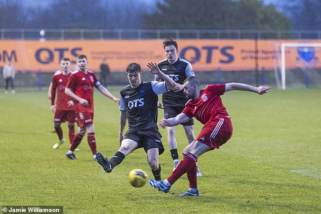 Darvel (in black strip) was eventually defeated 3-2 by their visitors