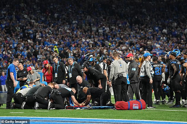 Dorsey, seen being treated by medical personnel while on the field in Detroit