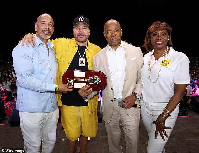 From left to right: Ruben Diaz Jr., Fat Joe, Mayor Eric Adams and Ingrid Lewis-Martin attend the Rise Up NYC concert with Fat Joe in New York City in August