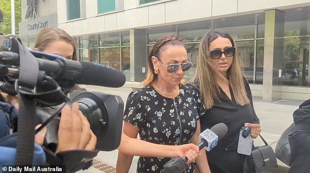 Paris Kennedy, 22, (right) is chased by reporters as she leaves the County Court of Victoria on Monday