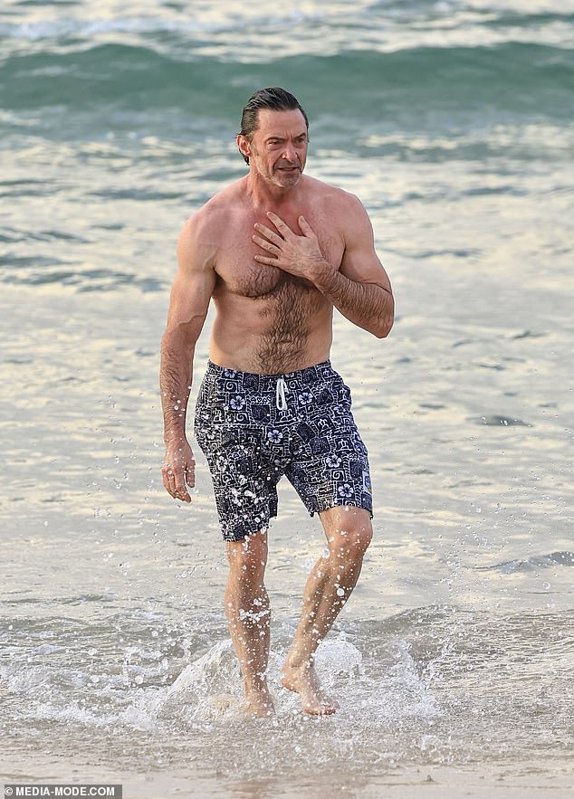 The actor, 56, didn't look too far off from his famous mutant character Wolverine as he showed off his washboard abs and muscular physique