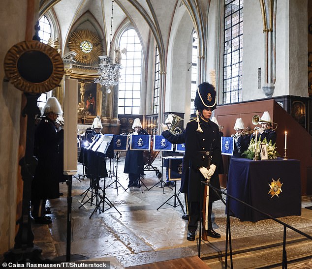 At the front of the church, soldiers wearing tall bearskin hats played instruments in honor of Princess Birgitta