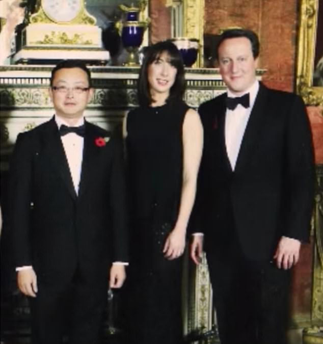 Yang Tengbo next to former Prime Minister Lord David Cameron and his wife Samantha