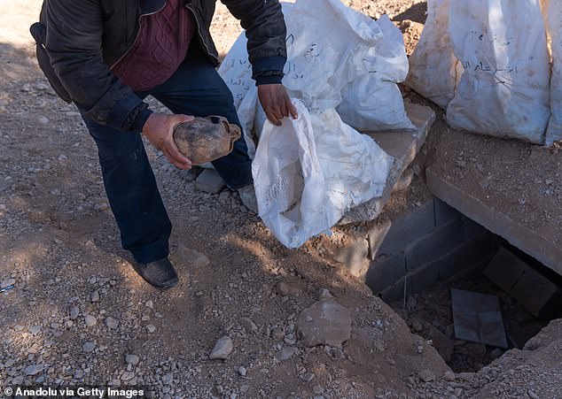 Eight bags of human remains were recovered from one deep ditch, providing a chilling insight into the severity of Assad's atrocities.