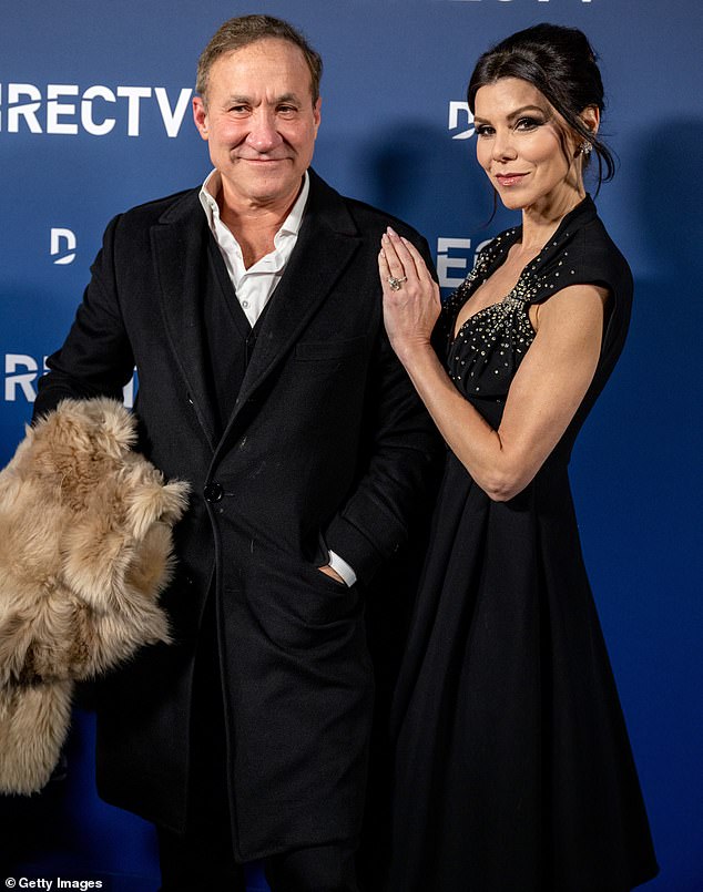 The reality TV star's post comes after Dubrow, a plastic surgeon, commented on Brandi's illness in a brief interview with TMZ; seen with wife Heather Dubrow on December 10