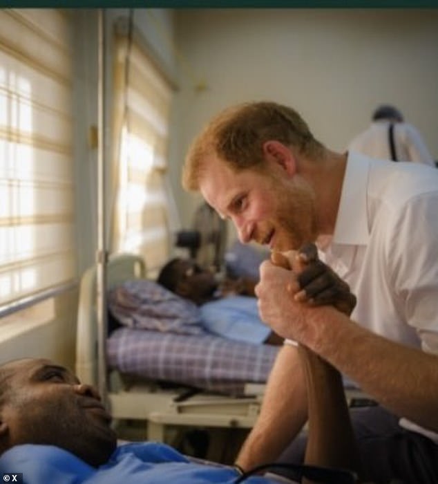 Prince Harry during a visit to the wards of the Nigerian military hospital Kaduna