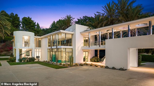 The beautiful house pictured at night