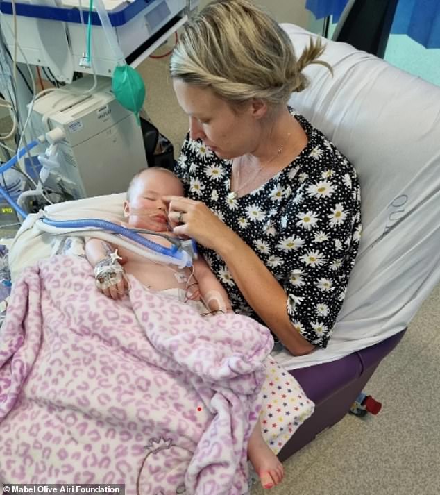 Mabel spent a week in intensive care before her parents made the heartbreaking decision to stop their daughter's life support. The six-month-old baby is pictured with her mother Carly Goya