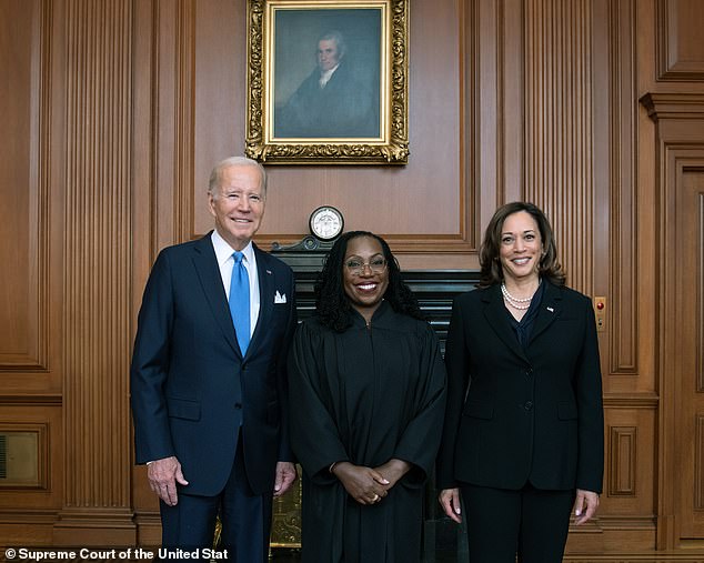 Jackson's stunt comes against the backdrop of low public confidence in the Supreme Court. She is pictured next to President Joe Biden and Vice President Kamala Harris