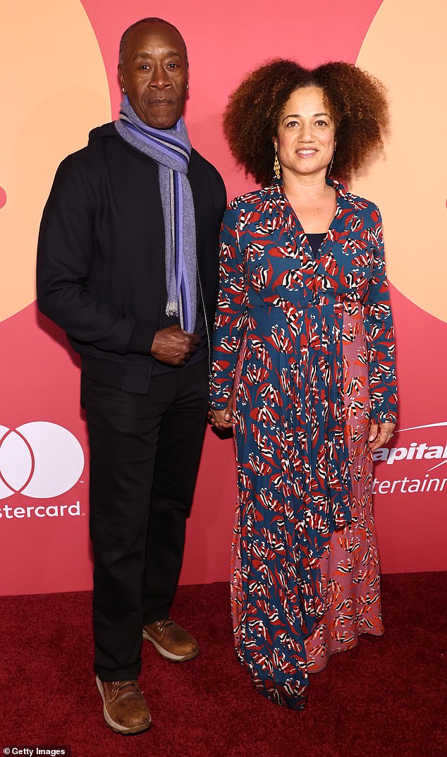 Don Cheadlie, 60, and wife Bridgid Coulter, 56, lovingly walked the red carpet holding hands