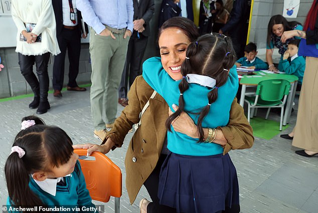 A photo of the Duchess of Sussex, Meghan, during an August visit to a kindergarten in Colombia