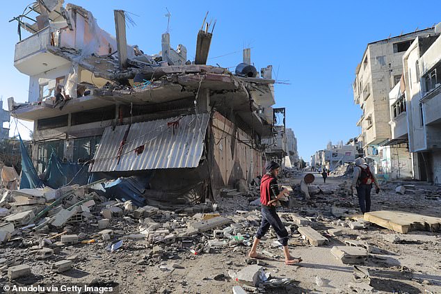 A view of the destruction caused by the Israeli forces' attack on a home belonging to the Al-Qarinawi family in the Bureij refugee camp in Gaza City