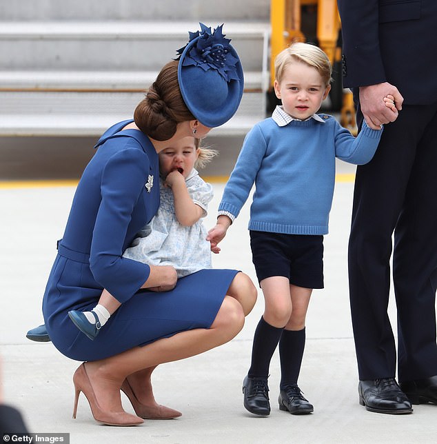 Kate was also pictured crouching at Victoria Airport next to a much younger Prince George and Princess Charlotte in 2016.