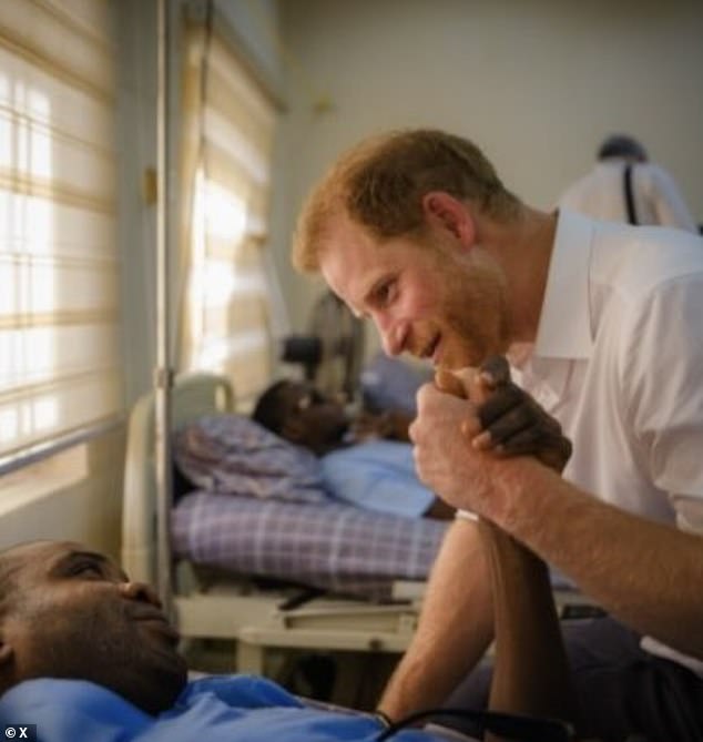 Prince Harry during a visit to the wards of the Nigerian military hospital Kaduna