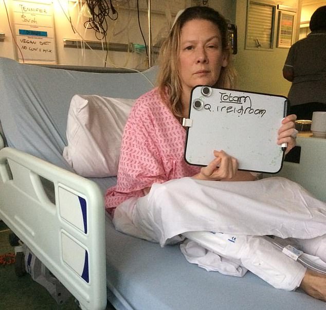 Jennie says she had to 'must up every last bit of strength' as ​​she tried to scribble a sentence on the whiteboard her husband Jamie brought to hospital to help her communicate