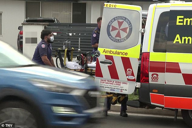 Footage from the scene showed ambulances and police cars on either side of the street as the child was wheeled out of the house