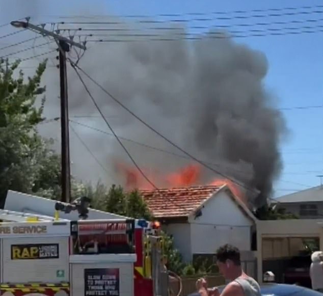 The woman was sleeping inside when smoke began pouring from her home in Adelaide