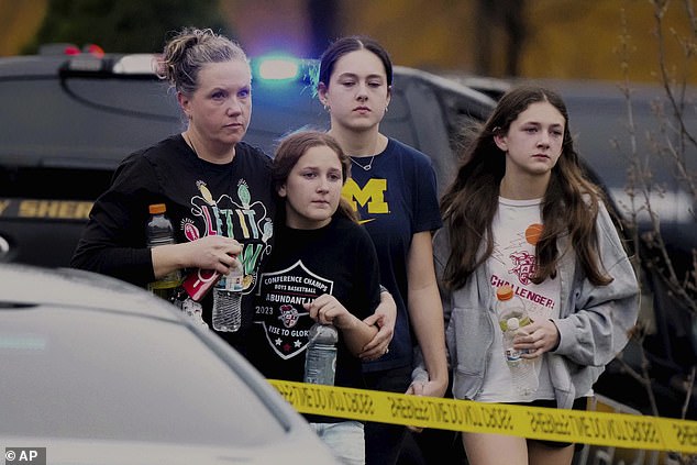 The shooting left two dead and six injured, two of whom are in critical condition. A family is seen leaving the reunification center after the tragedy