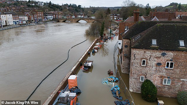 There are currently more than 6 million properties in England at risk of flooding. This includes 2.4 million properties at risk of being flooded by rivers or seas, which could lead to particularly deep flooding. Pictured: The River Severn bursts its banks at Bewdley, Worcestershire, after Storm Darragh