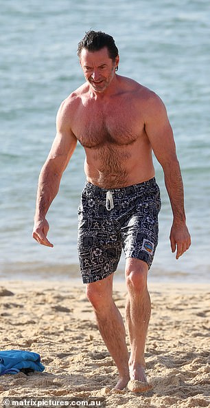 Hugh proved he hasn't let his hard work go to waste as he continued to show off his enviable muscles during his day out at the beach