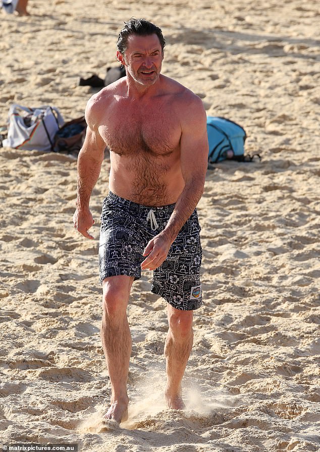 Hugh, who lives in New York, showed off his toned body while going shirtless during his beach outing