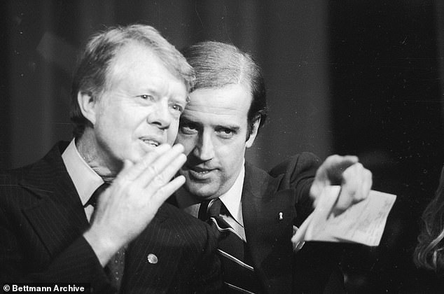 President Jimmy Carter, who is now 100 years old, photographed with then-Senator. Joe Biden in 1978, the last time the Dow Jones Industrial Average fell nine days in a row