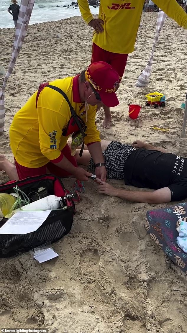 Tim was assisted by surf lifesavers (pictured) on the beach after the shock accident, with Kendall revealing she plans to contact them to thank them for their help