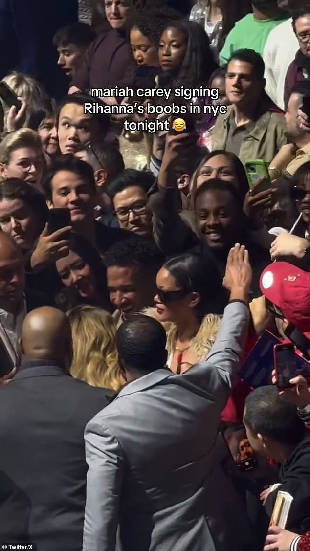 An excited Rihanna grabbed a microphone and told the crowd, “Mariah Carey is signing my t*t, y'all. This shit is fucking epic'