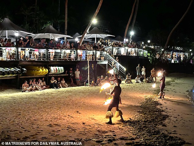 The resort was packed with guests on Tuesday evening, 72 hours after six tourists were rushed to hospital after drinking cocktails (pictured)