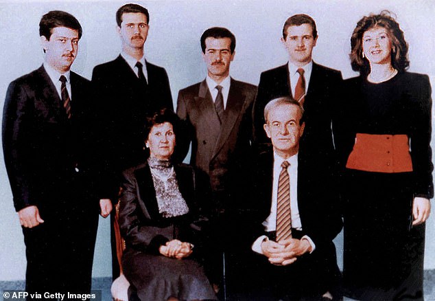 Maher (left) was the youngest son of former Syrian President Hafez al-Assad. The family is pictured in 1985