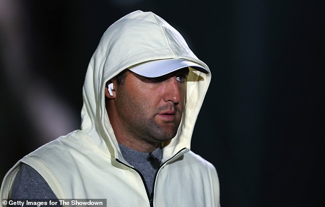 World No. 1 Scheffler bundles up against the cold after temperatures plummeted on Tuesday