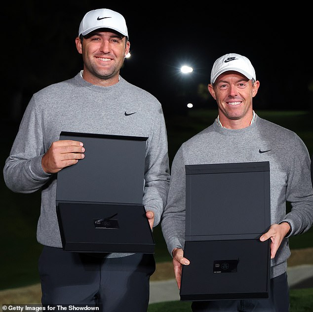 Scheffler and McIlroy pose with their $10 million cryptocurrency prize