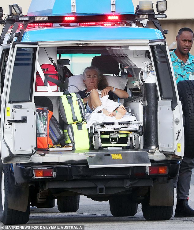 Ambulances and stretches took the woman to the steps of the air ambulance as she left Fiji and landed in Australia