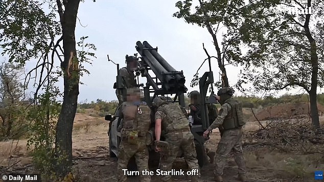 Footage shows Ukrainian soldiers running around a vehicle and loading missiles into the launcher, before taking cover a few meters away and firing two missiles in quick succession